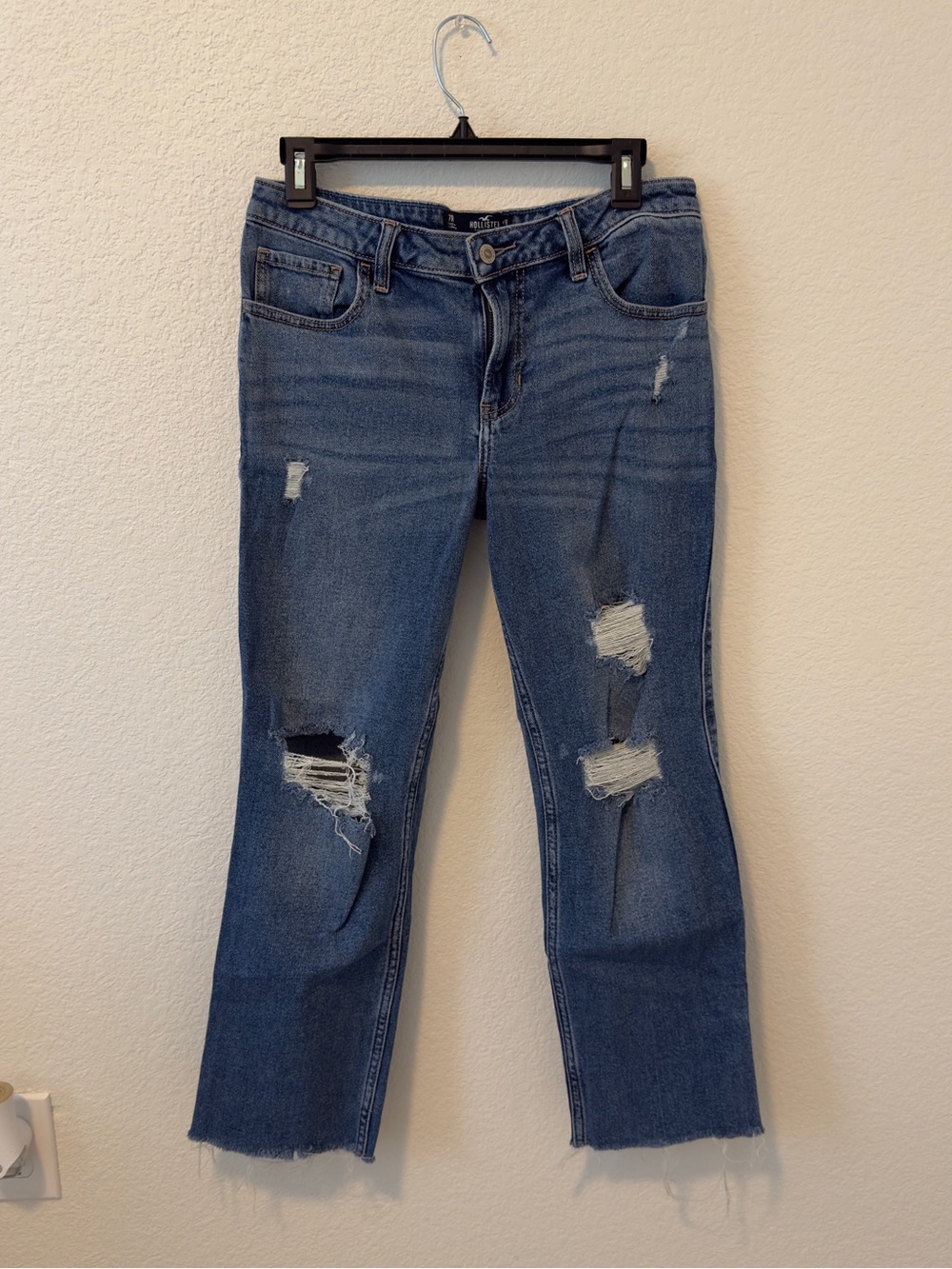 Hollister Co. blue denim jeans with ripped details